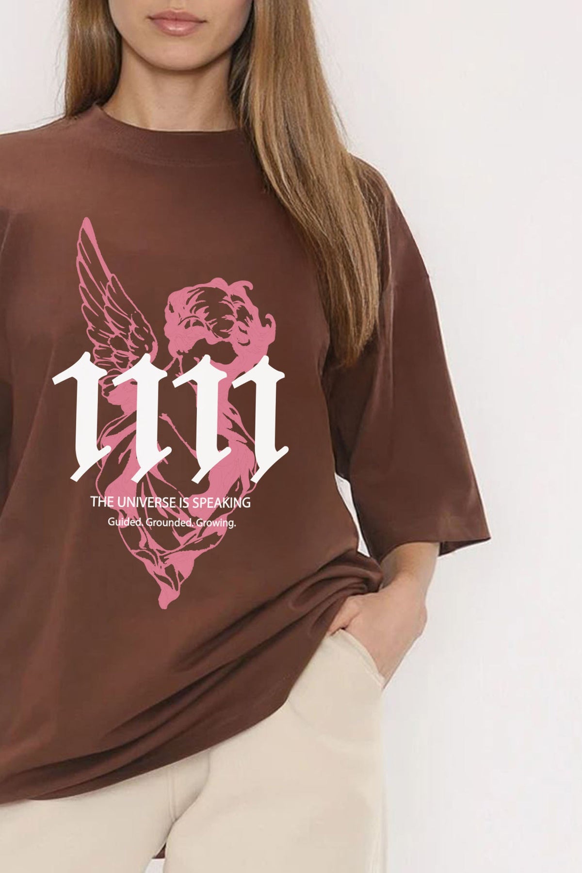 Oversized Brown T-shirt with pink guided angel line art | Missi wholesale AW25/26 collection