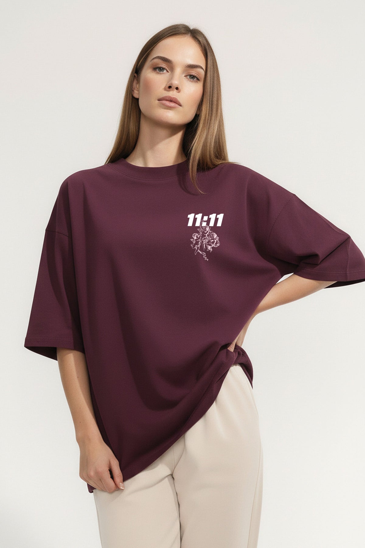 Dark cherry oversized T-shirt with white 11:11 angel chest print, model wearing casual fit | Missi Clothing AW25/26.