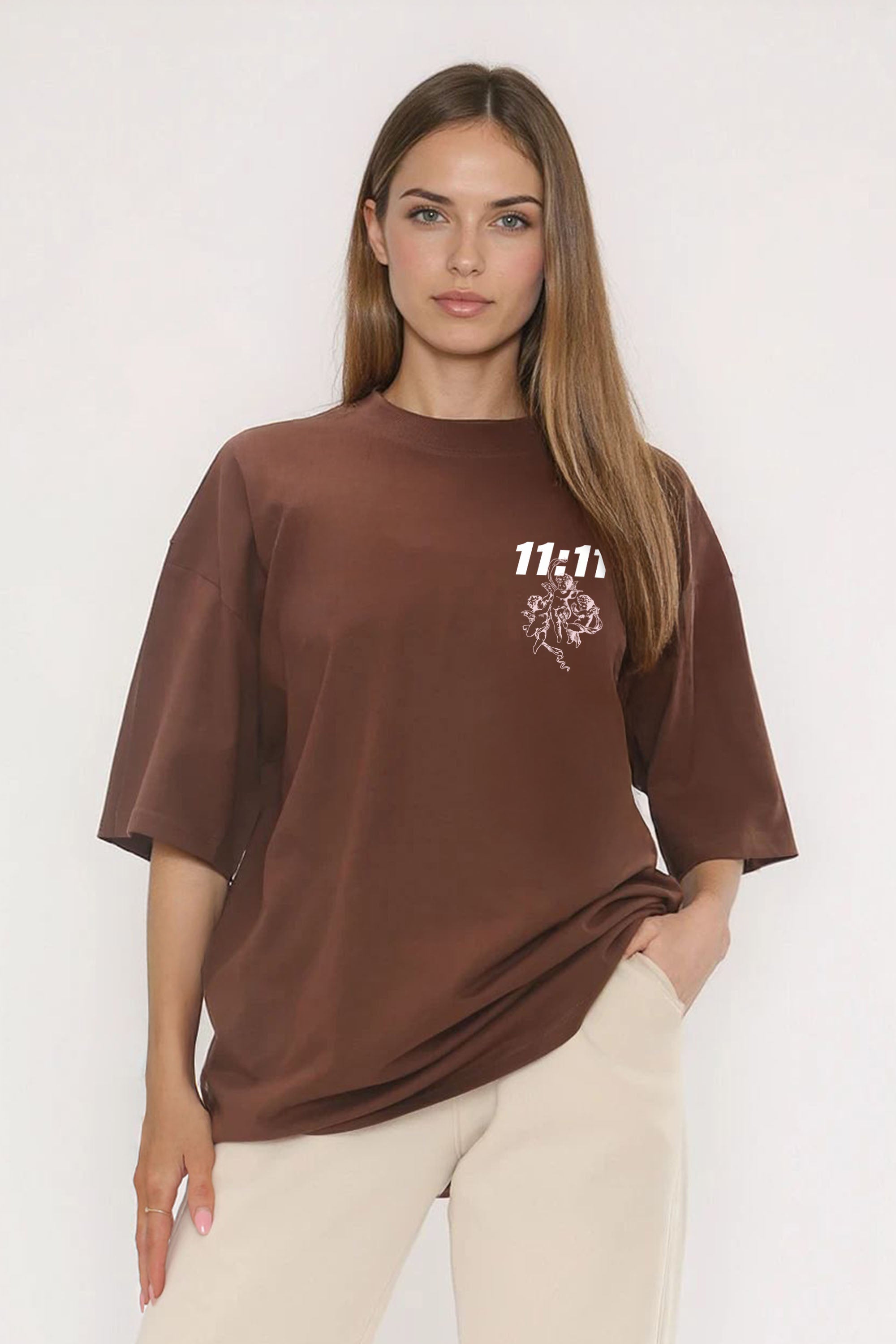 Brown oversized T-shirt with white 11:11 angel chest print, model wearing Oversized fit – Missi Clothing AW25/26.