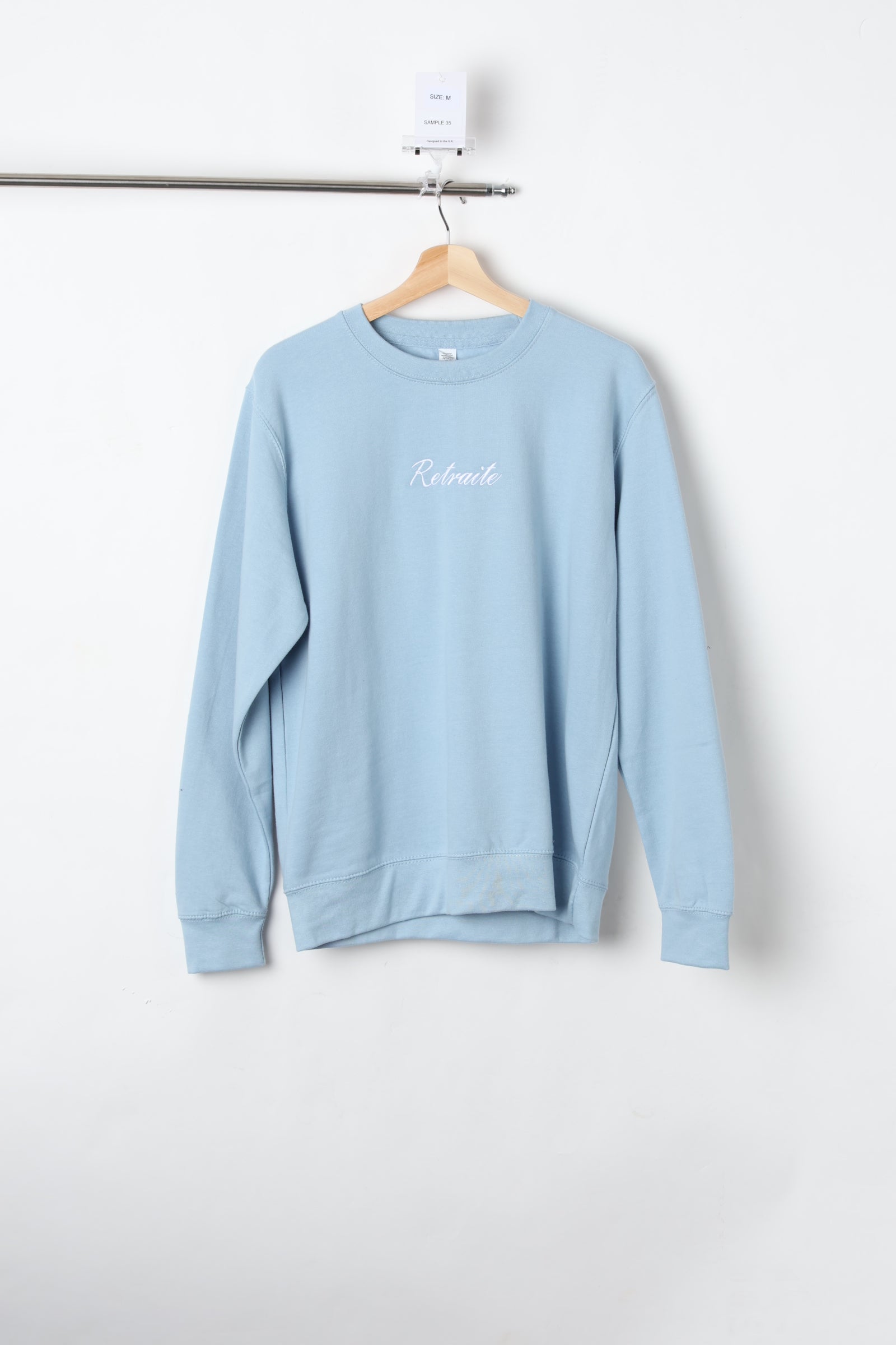 Retraite Front Embroidery & Printed Powder Blue Sweatshirt (Size M) – Sample